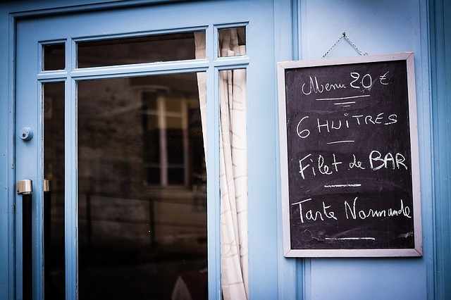 Door with a hanging chalkboard
