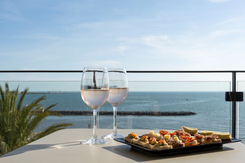 Sea view with glass of rose and appetizers Splendid Hotel Camargue