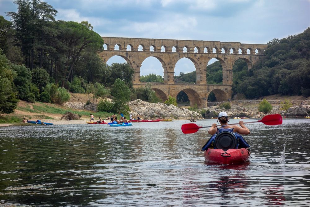 Kayaking under the Pont du Gard a Roman Aqueduct in Southern France