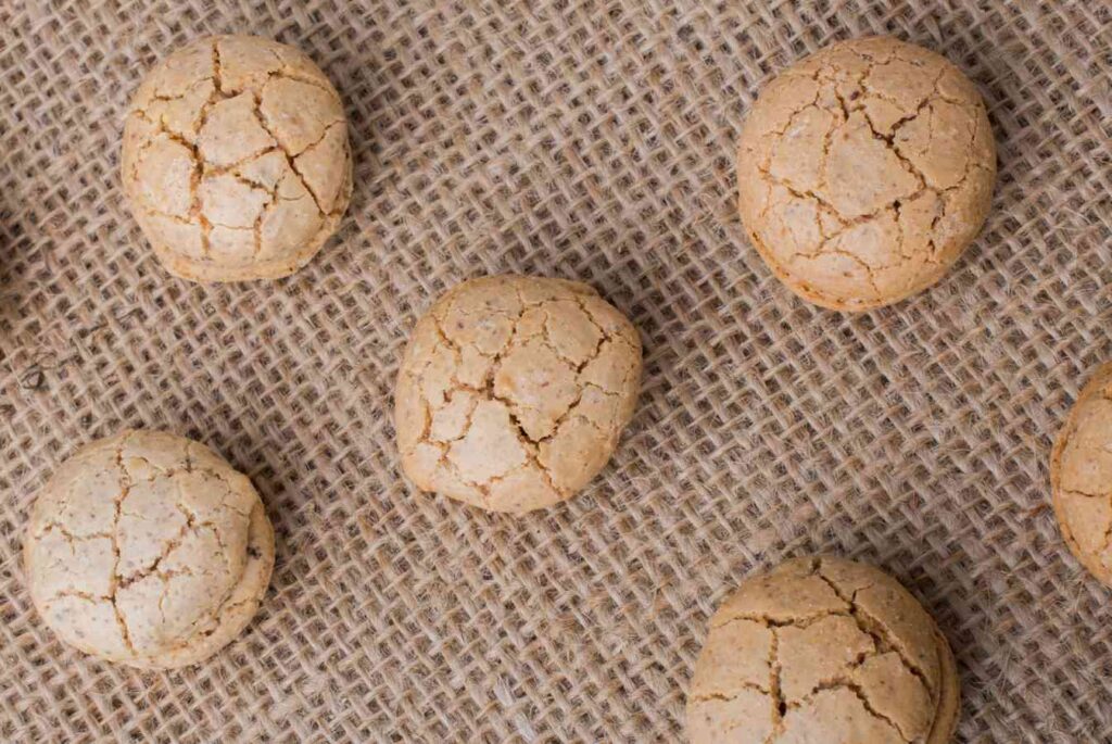 Traditional round almond cookies of St Emilion on a burlap background