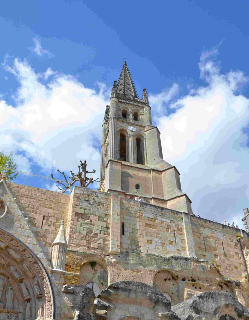 Gothic portal of the Monolithic Church of Saint-Émilion on the market square