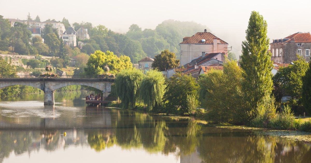 Bridge in Montignac village, limestone cliffs of the Vézère River Valley, home to the prehistoric art of the Dordogne